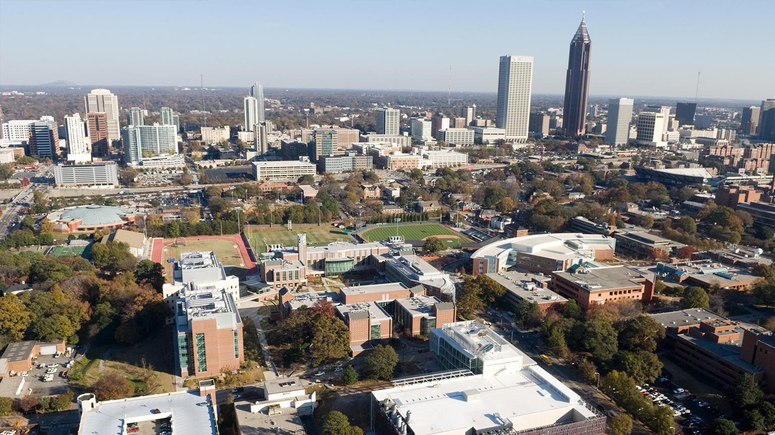 Atlanta cityscape and the Georgia Tech campus. Life Sciences and Technology Complex - Ford Motor Co. Environmental Science and Technology Building (ES&T), U. A. Whitaker Biomedical Engineering Building (BME), Parker H. Petit Institute for Bioengineering and Bioscience (IBB), Molecular Science and Engineering Building (M Building), Marcus Nanotechnology Building, Klaus Advanced Computing building, Russell Chandler baseball stadium, Alexander Memorial Coliseum
