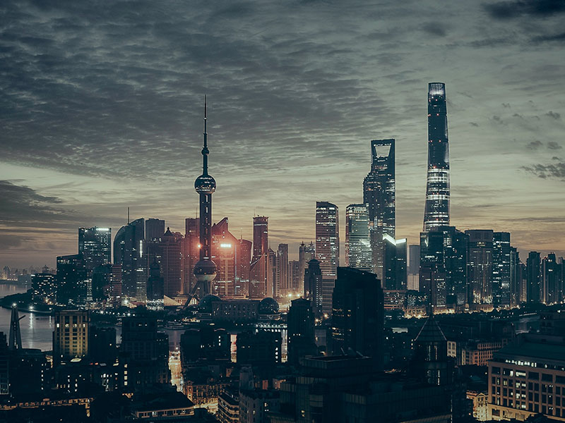 Shanghai Skyline in the evening, photo by Adi Constantin on Unsplash.